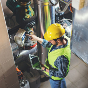 facility manager checking water management data