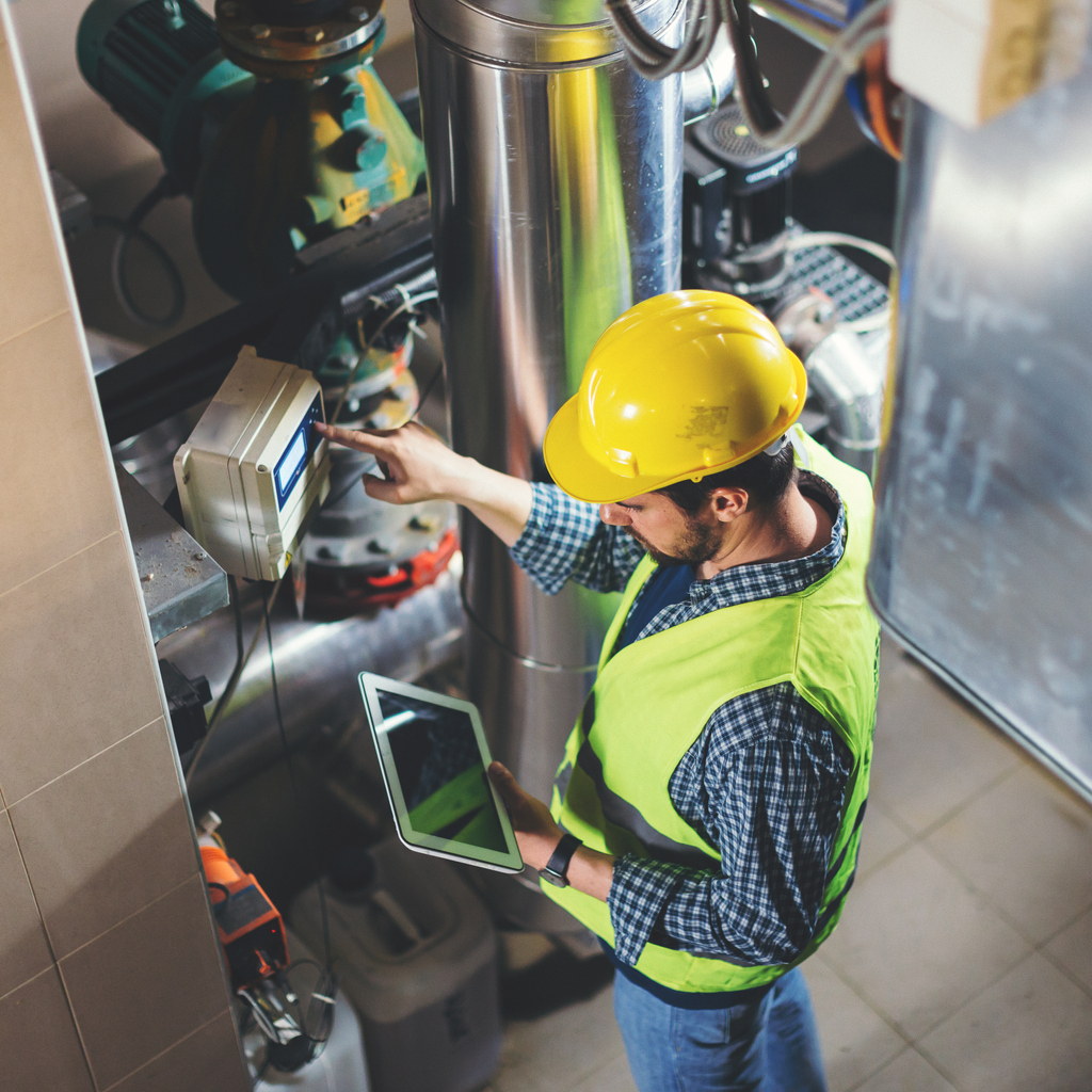 facility manager checking water management data